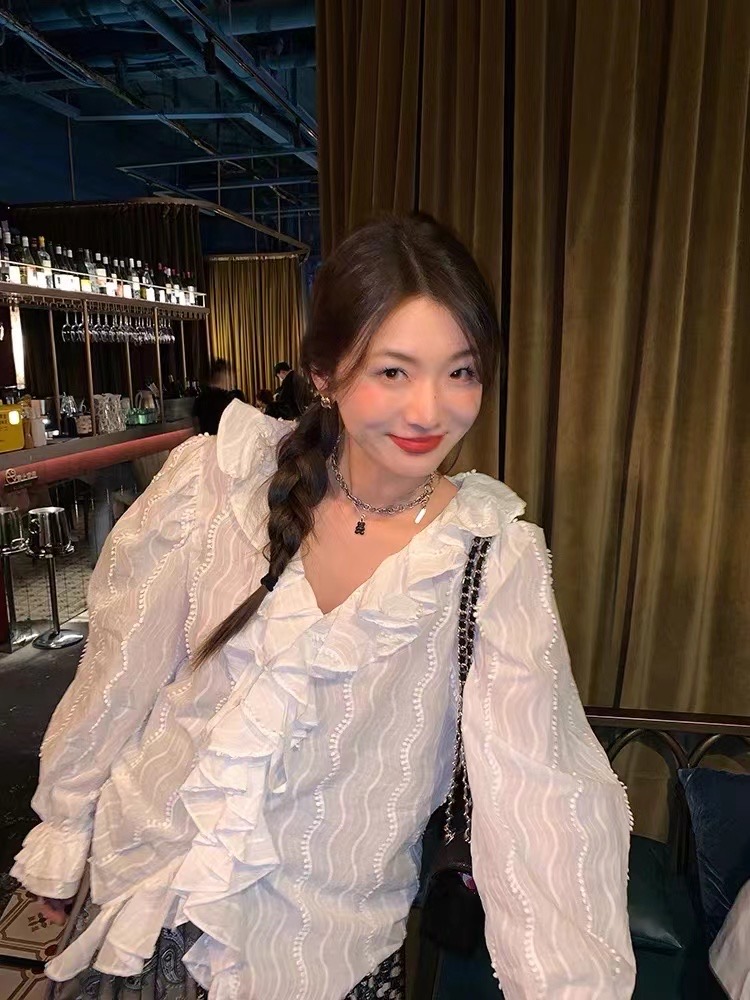 落落狷介白色襯衫女設計感小眾2024年春季新款長袖荷葉邊法式上衣