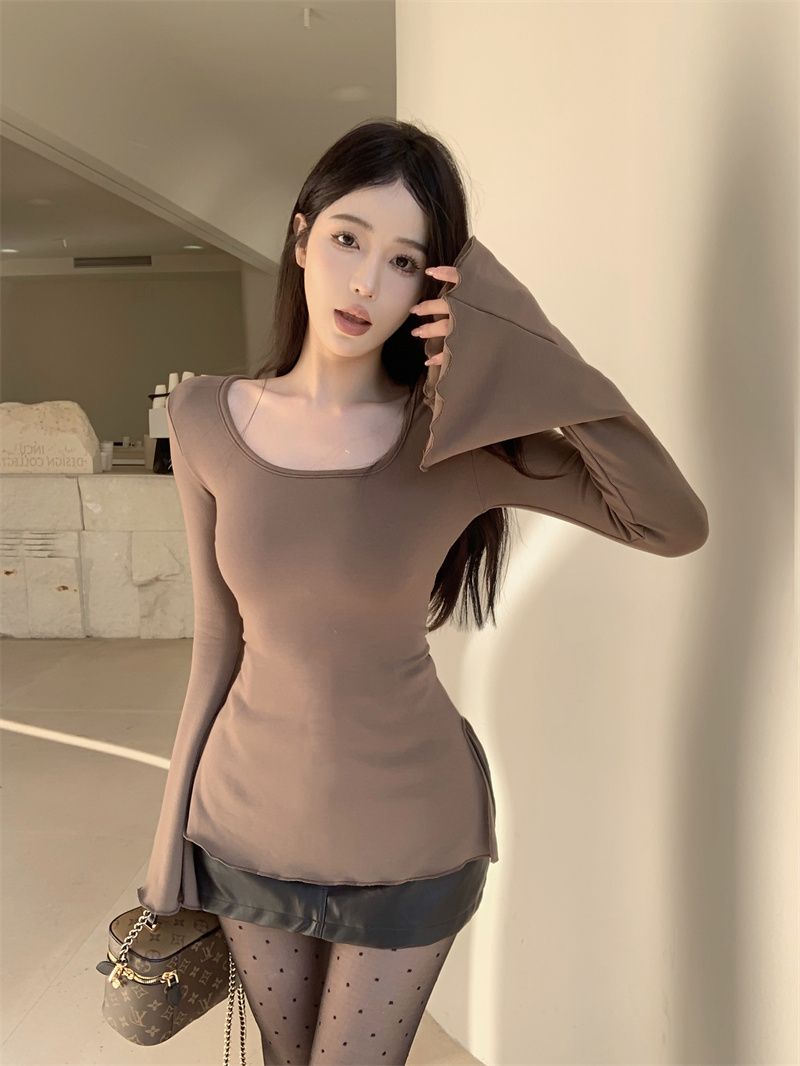 Has been shipped Hong Kong fashion simple style bell sleeve long sleeve T-shirt women's spring and autumn irregular slim slit top