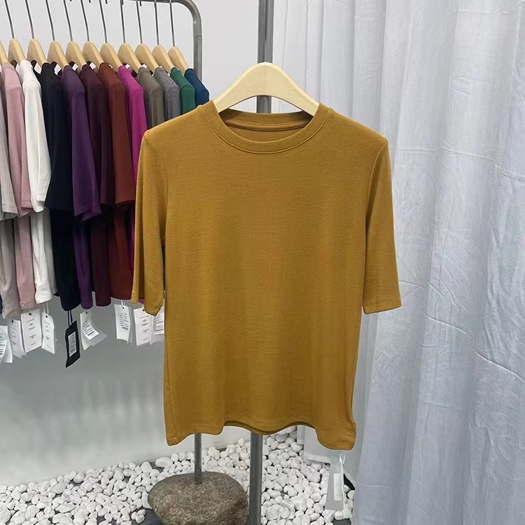 Early spring new slim-fitting half-sleeved T-shirt for women, white quarter-sleeved inner layered shirt, round neck top
