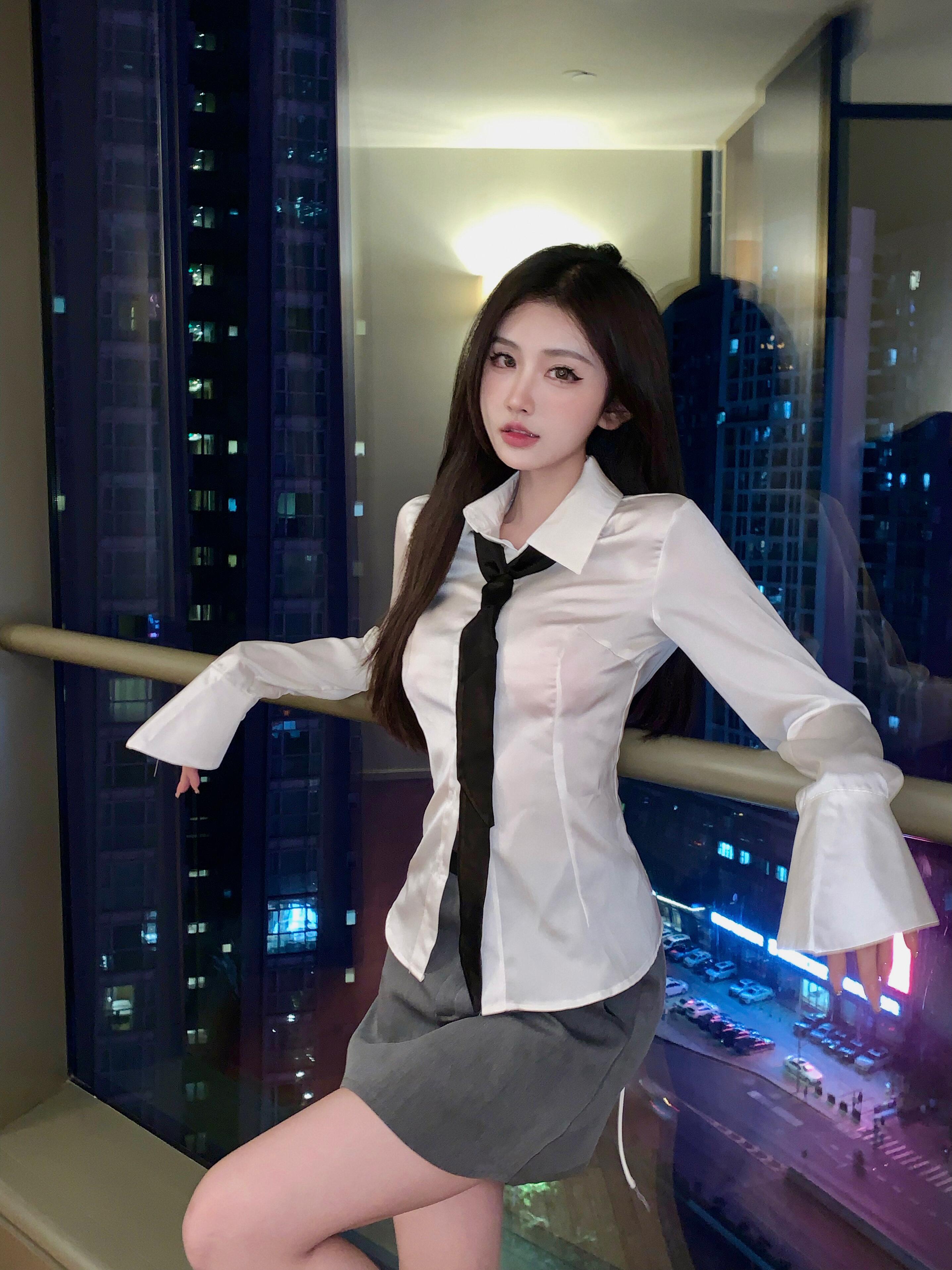 Actual shot of Pure Desire strappy design slim bell sleeve shirt