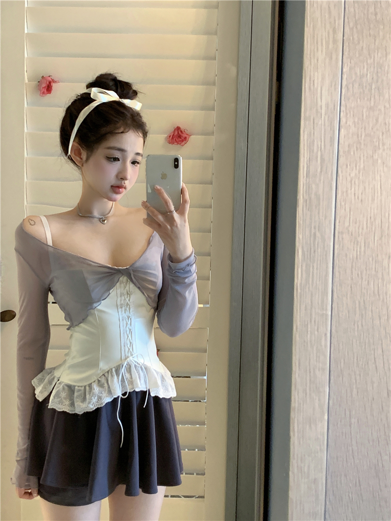 Real shot of a ballet trainee looking slim and elegant in a waistcoat, lace suspender skirt and culottes suit