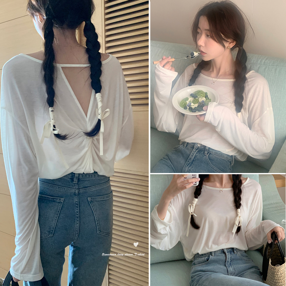 Actual shot of Korean style thin slightly transparent solid color loose twisted chic long-sleeved T-shirt with hollow back