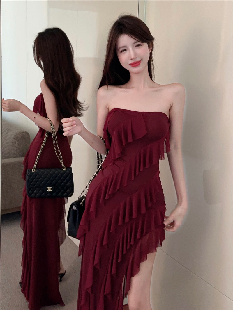 Actual shot of a strapless, backless, slit fringed dress