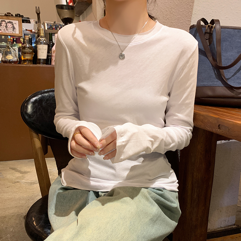 Real shot of basic long-sleeved bottoming shirt for women in early spring snowflake cotton T-shirt with solid color round neck right shoulder top
