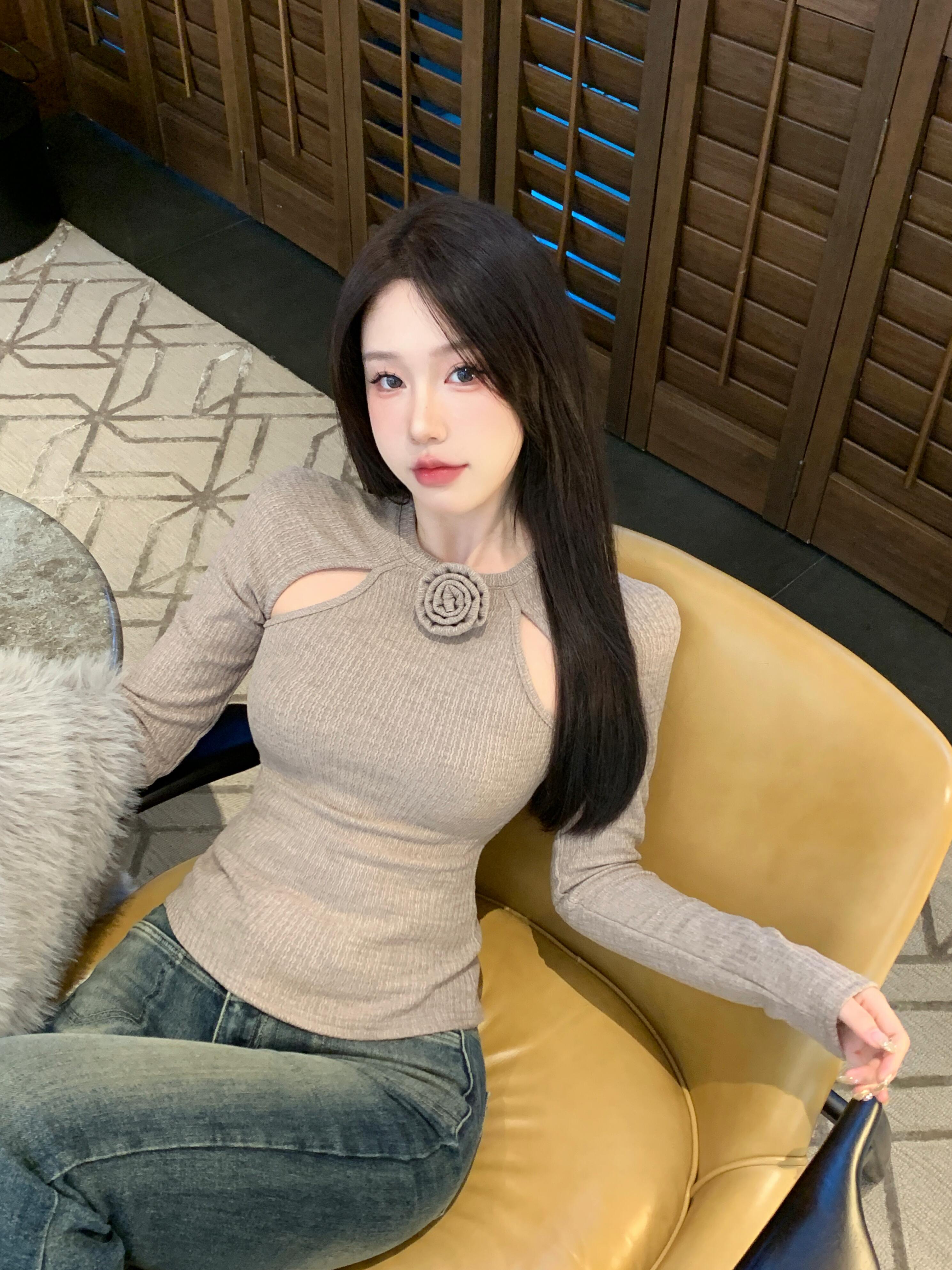 Actual shot of a chic three-dimensional rose hollow slim fit round neck long-sleeved top with a sense of design