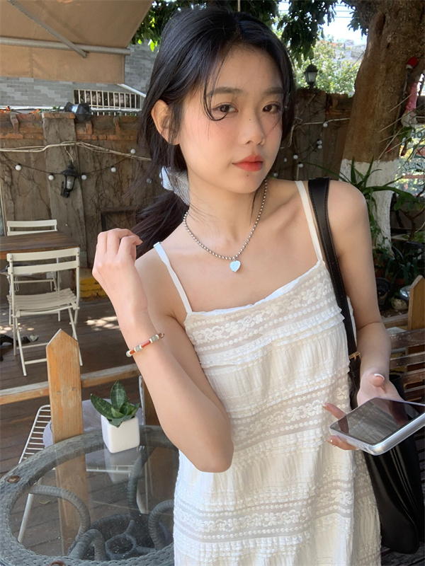 Real shot of new fresh white lace suspender high-end dress