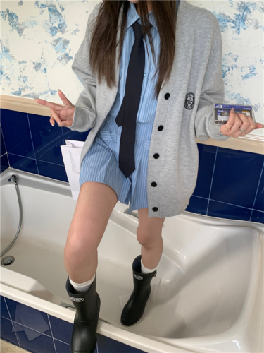 Real shot of college style layered suit, baseball jacket + long-sleeved striped shirt skirt two-piece set