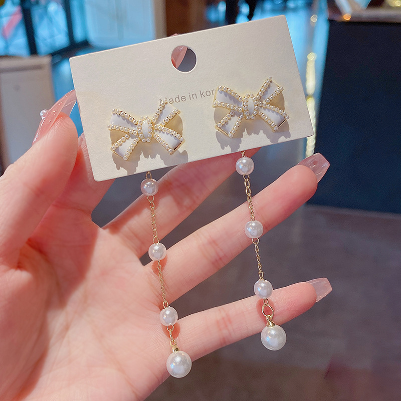 Real shot S925 silver needle light luxury simple bow long tassel earrings female internet celebrity same style earrings