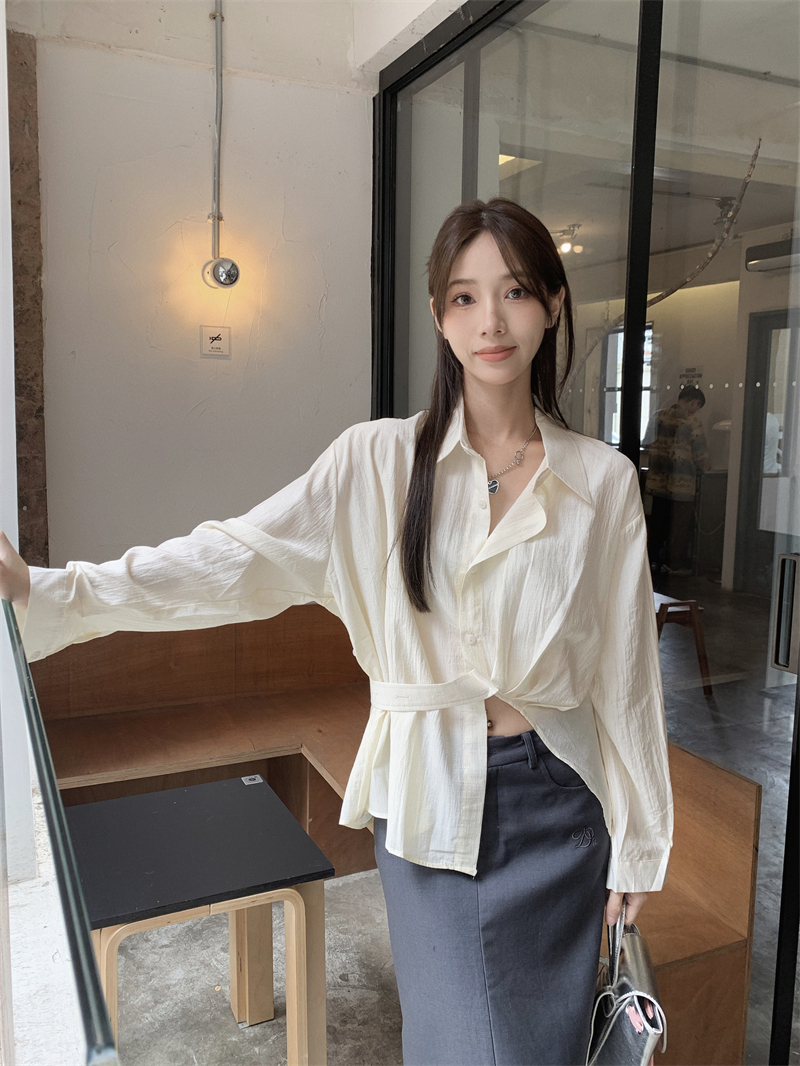 Actual shot of spring Korean style loose diagonally tied waist slimming design irregular shirt long-sleeved top for women