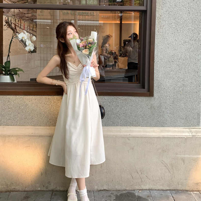 茶歇法式白色無袖吊帶連衣裙女氣質小個子溫柔高級感收腰顯瘦長裙