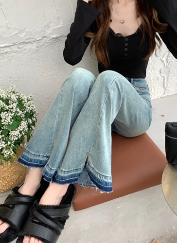 Actual shot #New high-waisted denim trousers for women, designed with leg slits and micro-flared floor-length trousers
