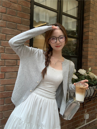 Actual shot~New Korean style loose and slim knitted cardigan suspender + skirt