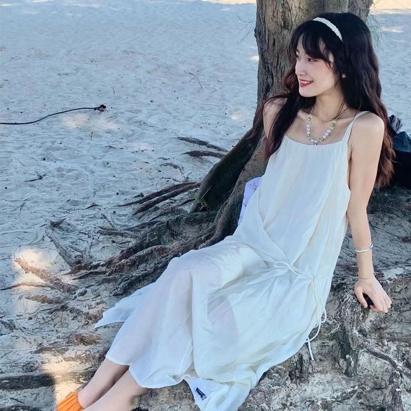 心中的白月光吊帶連衣裙女夏季海邊度假風法式氣質綁帶收腰長裙