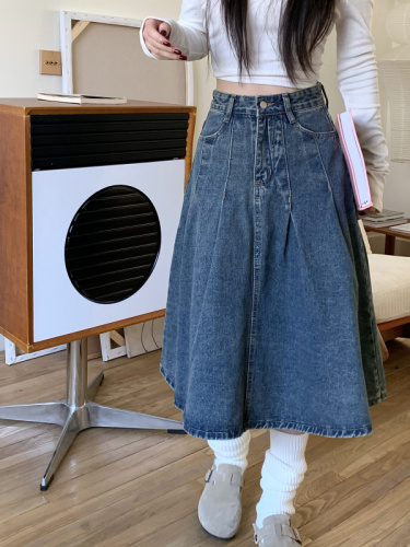 Actual shot of vintage washed distressed A-line pleated denim umbrella skirt