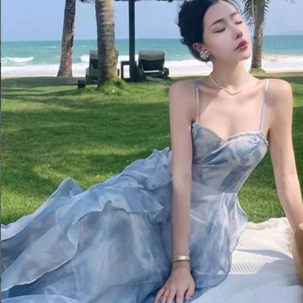 茶歇法式藍色吊帶連衣裙女夏季新款海邊度假沙灘長裙日落仙女裙子