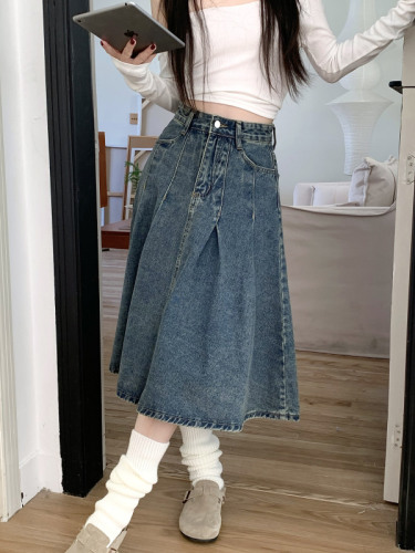 Actual shot of vintage washed distressed A-line pleated denim umbrella skirt