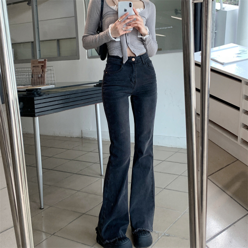 Actual shot of smoked black stretch pants and jeans, high-waisted bootcut pants, floor-length pants for women