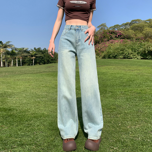 Actual shot of new spring light blue ripped jeans for women, high-waisted, slim, straight, small, floor-length wide-leg pants