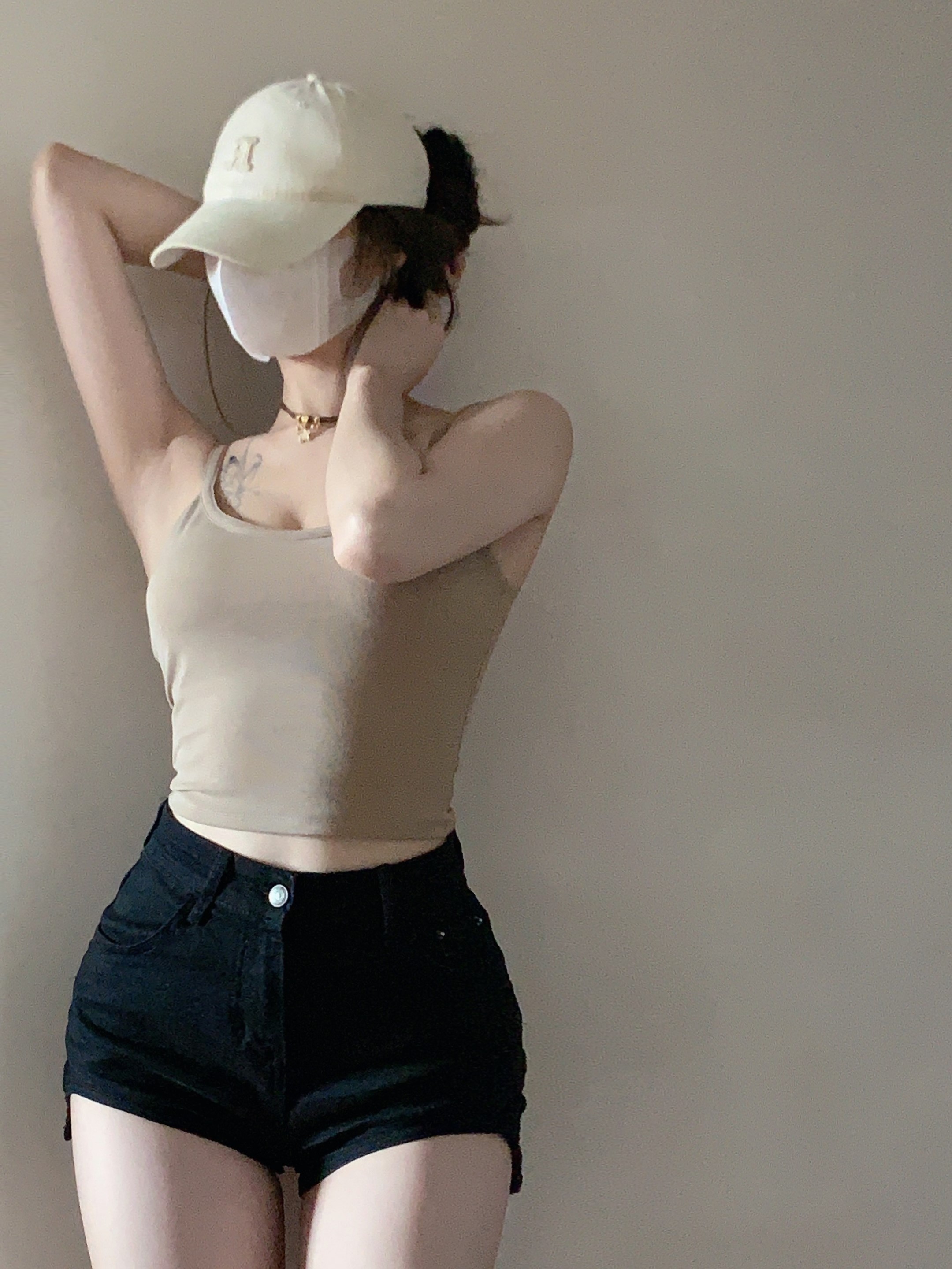 Real shot of a hot girl’s basic camisole with breast pads and sleeveless bottoming top worn inside and outside
