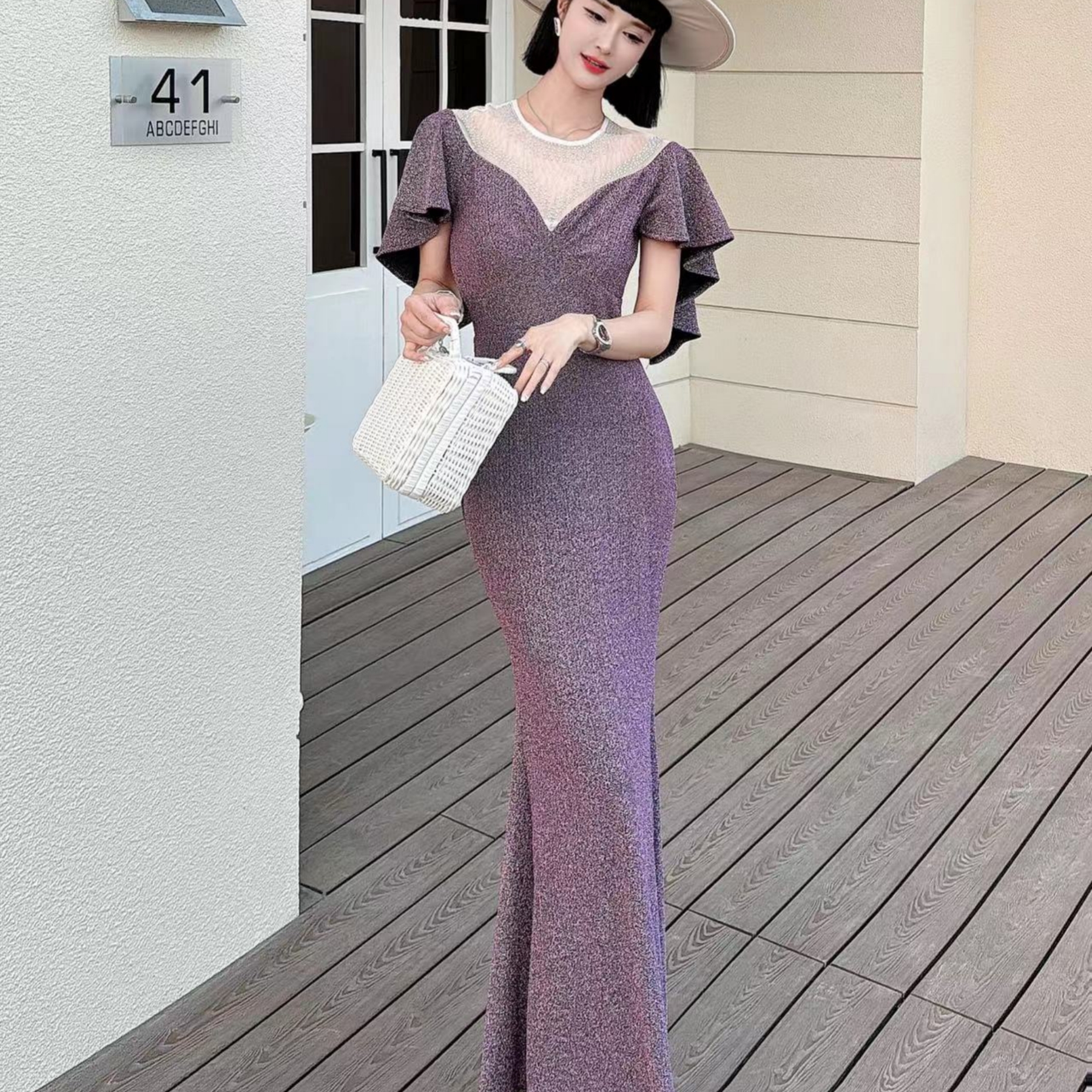Real shot of long elegant banquet fishtail annual meeting host long dress