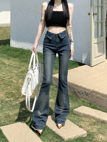 Actual shot of low-waisted double-waist elastic cuffed vintage bootcut jeans