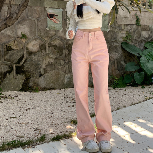 Actual shot of girly pink straight wide-leg pants, high-waisted, fresh and slim jeans