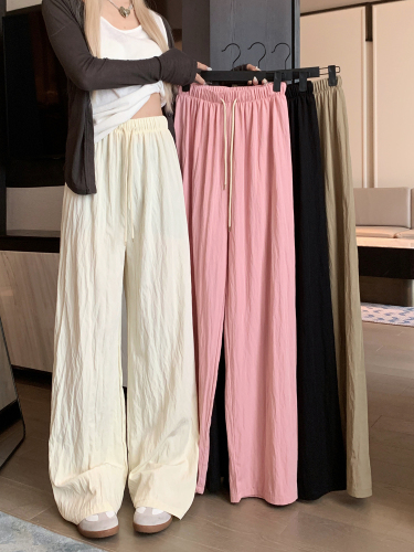 Actual shot of lazy, simple, drapey drawstring casual pants, high-waisted slimming floor-length pants