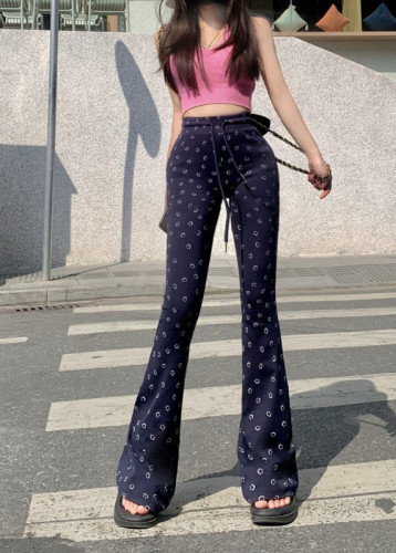 Actual shot of high-waisted slimming smiley face printed bell-bottoms and versatile pants