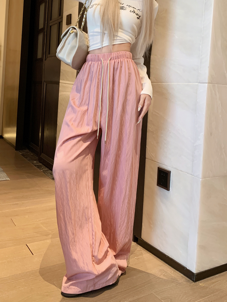 Actual shot of lazy, simple, drapey drawstring casual pants, high-waisted slimming floor-length pants