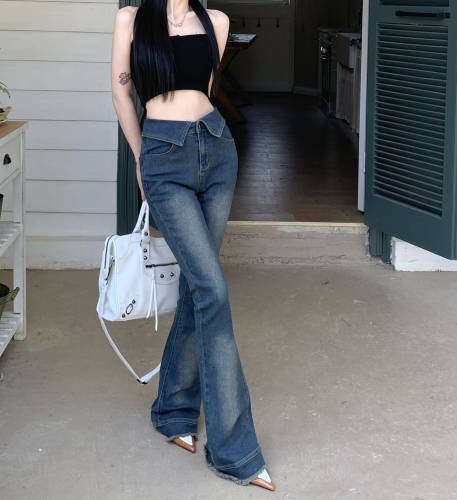 Actual shot of low-waisted double-waist elastic cuffed vintage bootcut jeans