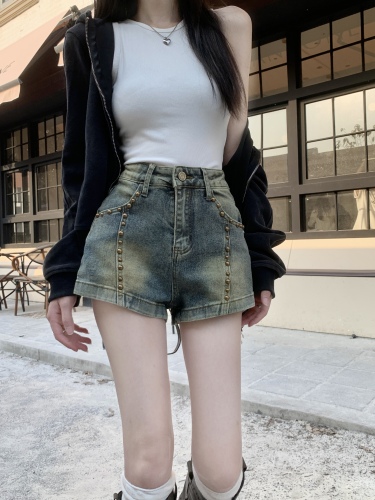 Actual shot of retro elastic all-match denim shorts with design rivets for women