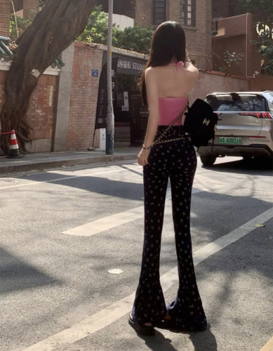 Actual shot of high-waisted slimming smiley face printed bell-bottoms and versatile pants