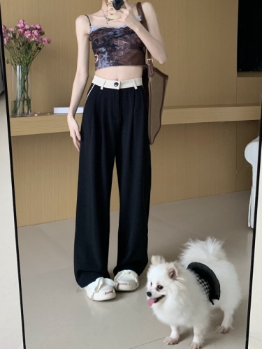 Actual shot of contrasting waistband straight-leg trousers with drapey slimming trousers and designed raw edges with diagonal pockets and wide-leg trousers