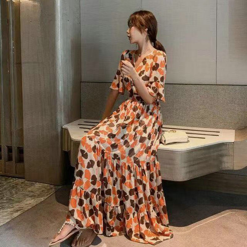 2024夏季新款油畫姐妹女裝小雛菊長裙顯瘦喇叭袖度假碎花連衣裙女