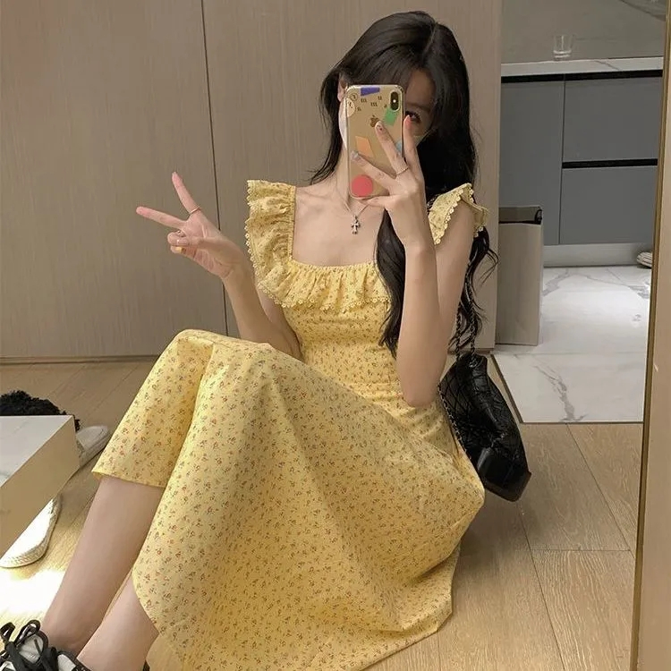 高級感碎花裙子女夏季法式收腰吊帶長款氣質顯瘦飛飛袖連衣裙