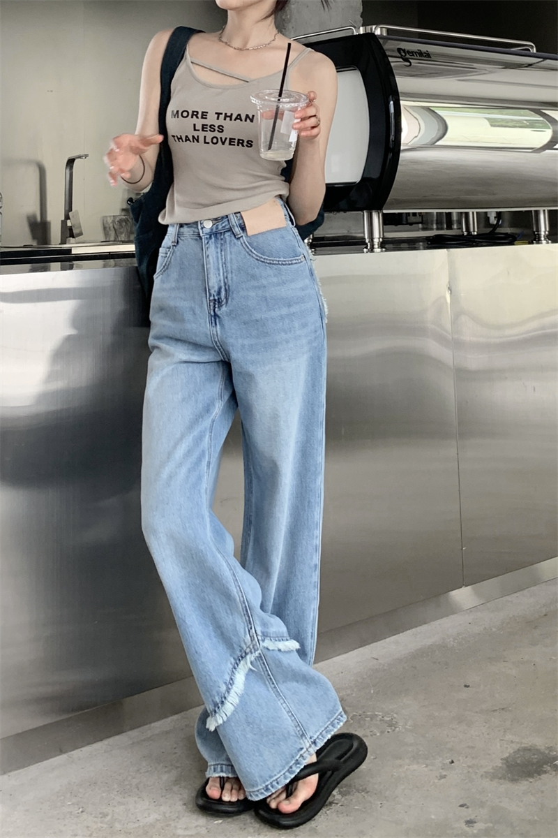 Actual shot of loose high-waisted wide-leg pants and straight-leg floor-length jeans