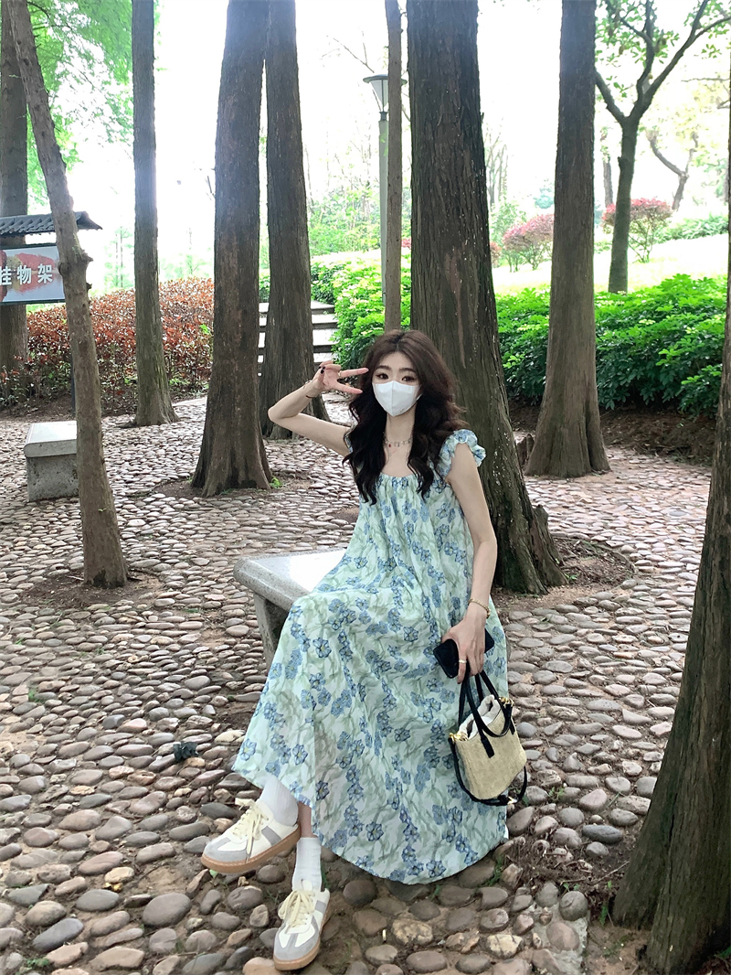 實拍#小飛袖設計感碎花長裙溫柔度假風出遊吊帶海邊連衣裙女