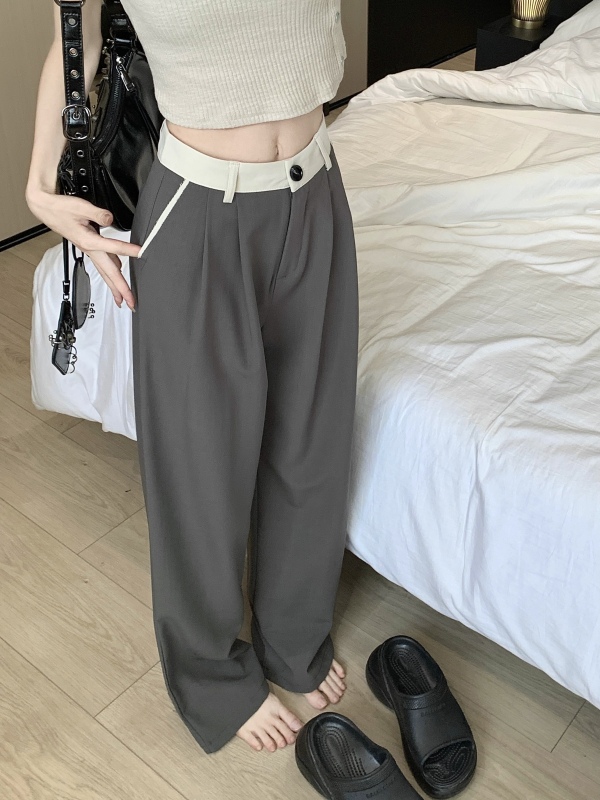 Actual shot of contrasting waistband straight-leg trousers with drapey slimming trousers and designed raw edges with diagonal pockets and wide-leg trousers