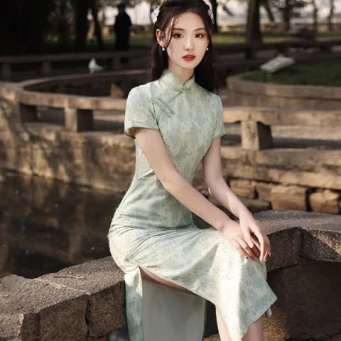 改良旗袍印花新款女夏季綠色年輕款少女連衣裙包臀裙長款復古氣質