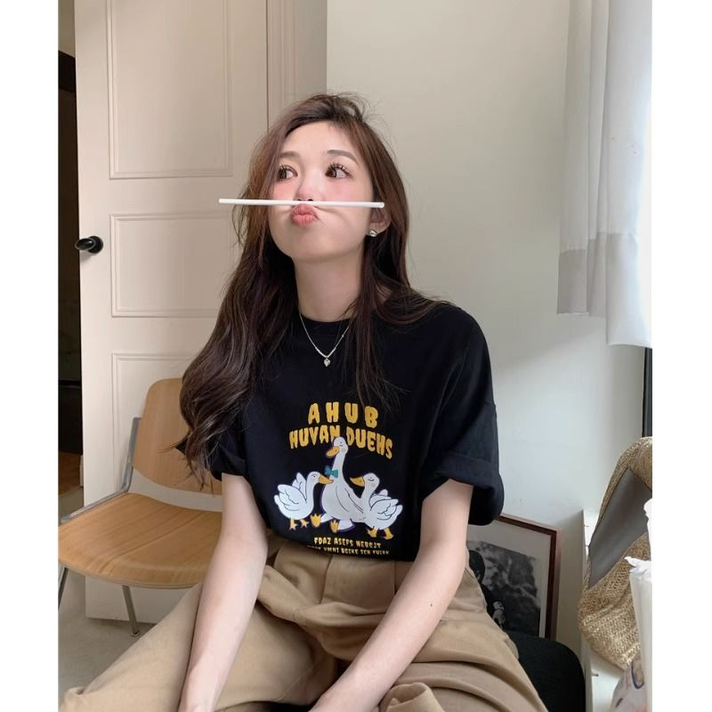 Age-reducing cartoon print short-sleeved T-shirt women's summer design niche round neck loose slimming top