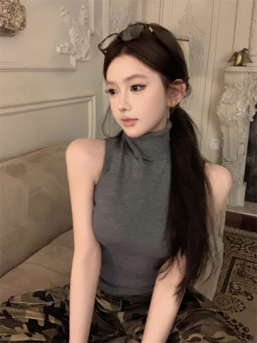 Real shot of high-necked yarn vest for spring outerwear hot girl American sleeveless top + slimming and versatile short skirt
