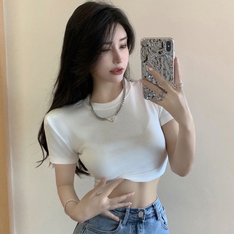 Actual shot of simple Korean style solid color short-sleeved T-shirt for women summer round neck exposed navel versatile high-waisted slim bottoming shirt