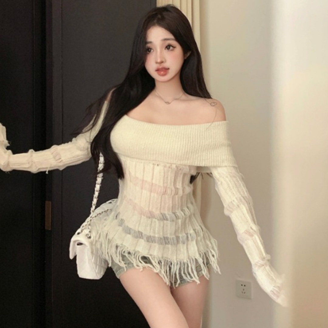 Retro one-line collar off-shoulder sweater for women in autumn design niche waist slimming long-sleeved hollow fringed top