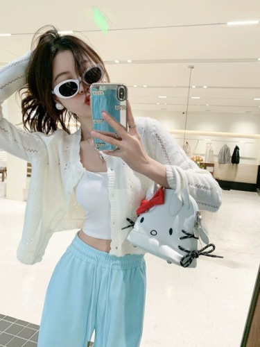 Zeng Xiaoxian Gummy Girl Small Hollow Short Knitted Cardigan Women's Early Spring Commuting Versatile Thin Top