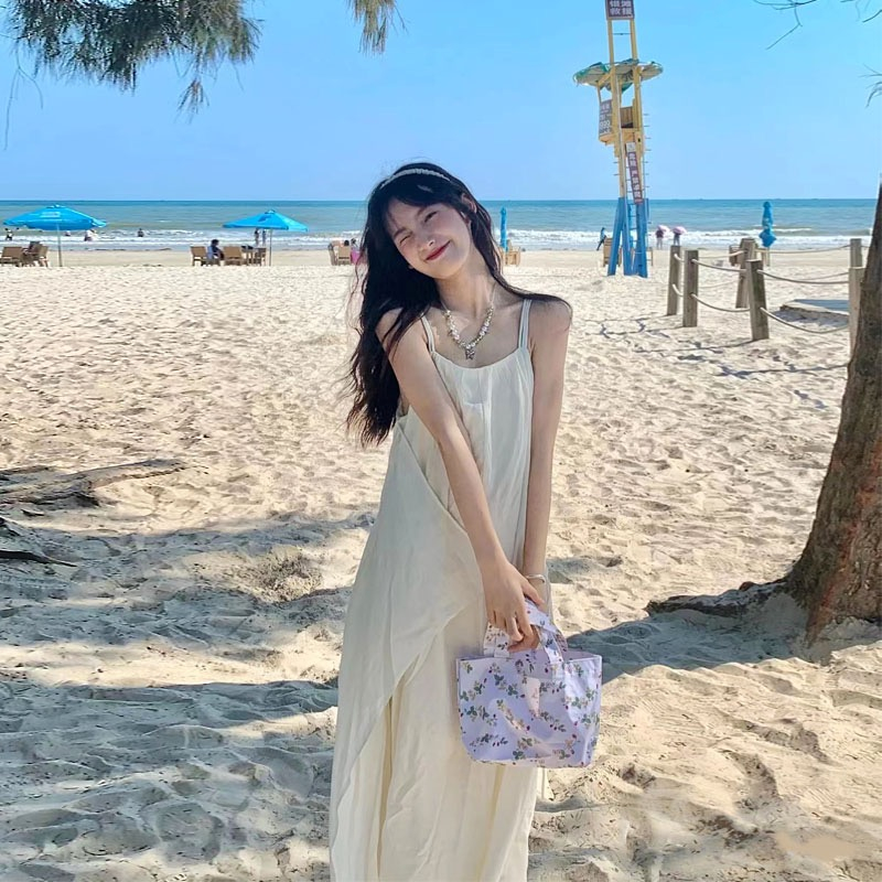 心中的白月光吊帶連衣裙女夏季海邊度假風法式氣質綁帶收腰長裙