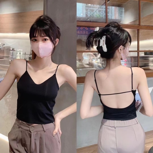 Hot girl wears a padded backless camisole with a beautiful back and a short top with a stylish design.