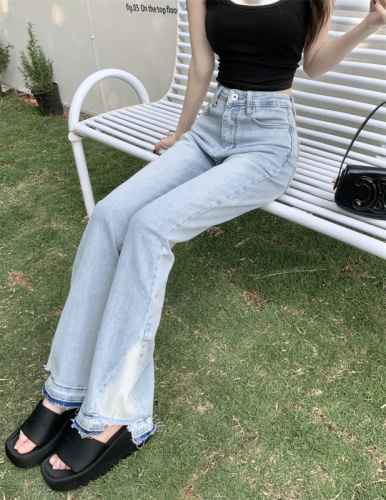 Actual shot of new high-waisted elastic slightly flared slim-fitting long raw edge jeans for women