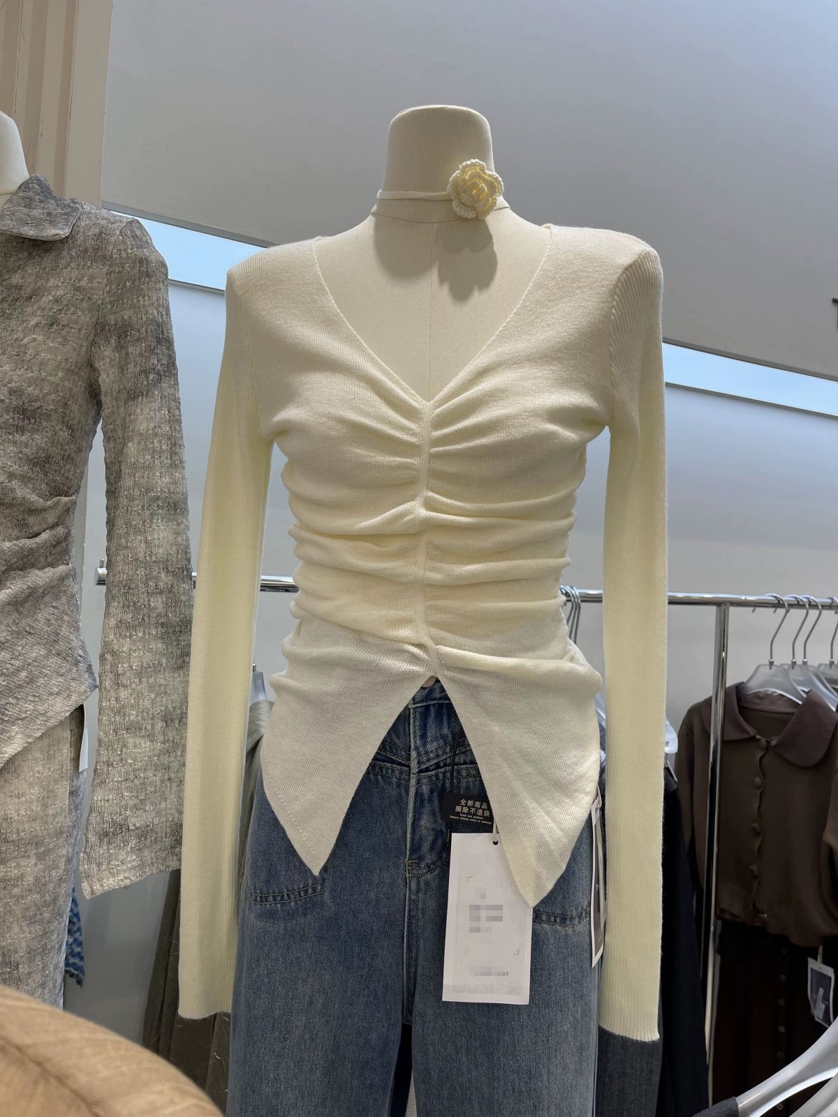 Thirteen lines of spring clothing for women 2024 new style irregular pleated fishbone tops sexy slim long-sleeved V-neck sweaters