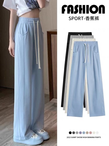 Not a real shot. Sports pants for women. New high-waisted casual sweatpants. Loose straight summer wide-leg pants.
