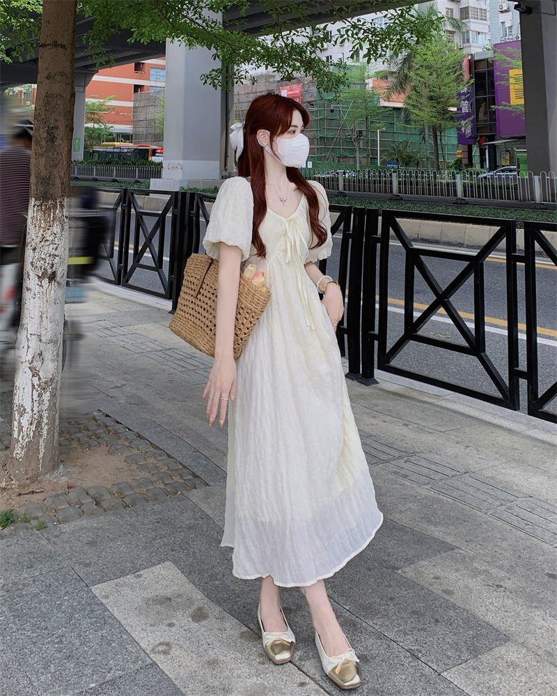 Actual shot of puff-sleeved lace-up dress